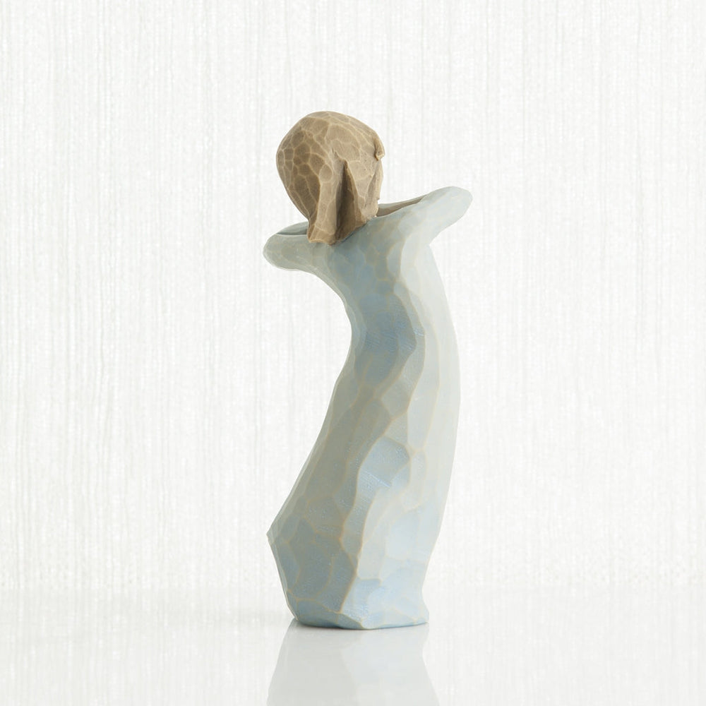 Journey figurine displayed as a new beginning and encouragement keepsake gift
